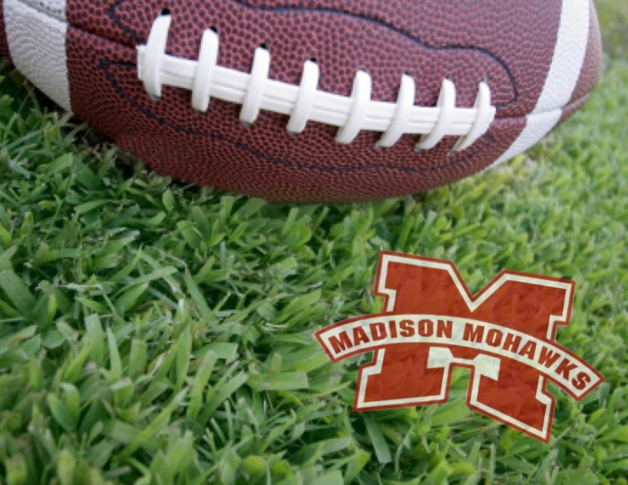 Football in grass poster with Madison Mohawks logo